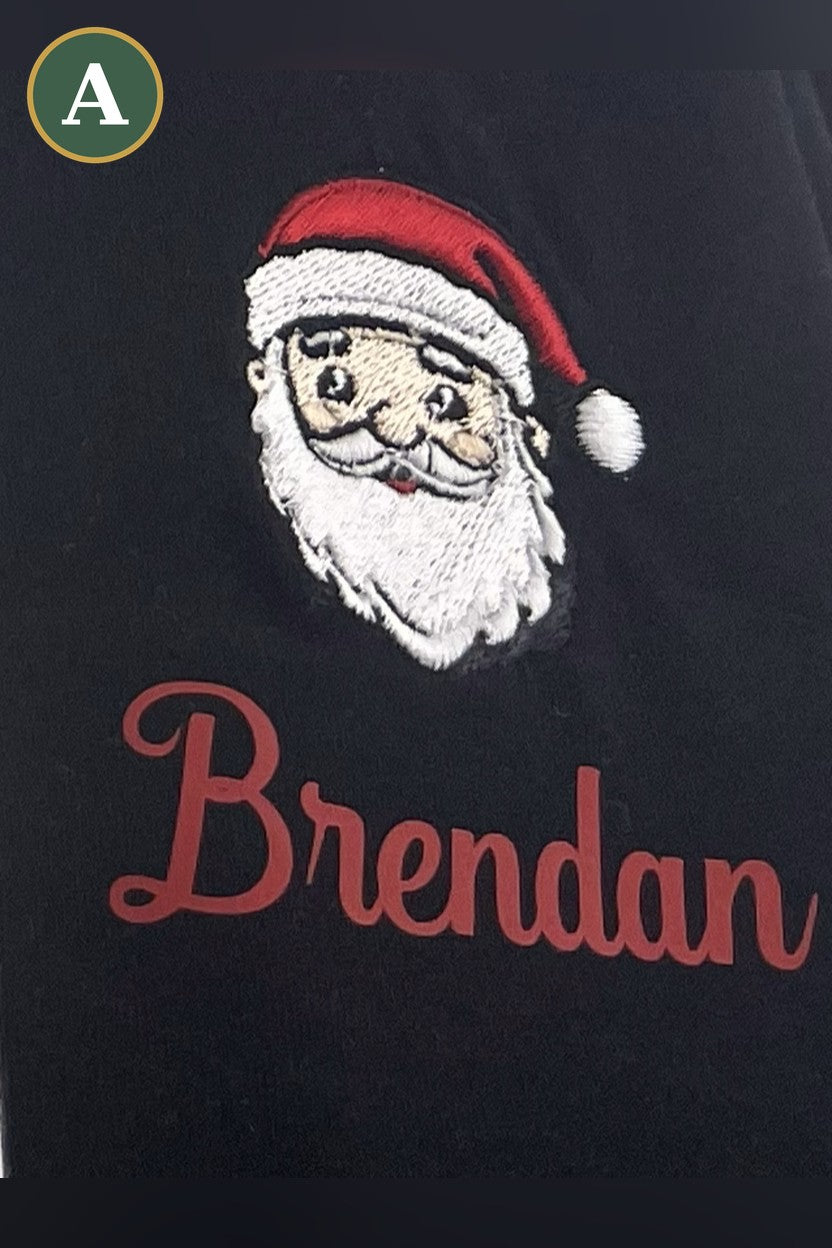 Option A: embroidered Santa logo with the printed name Brendan on a black tee