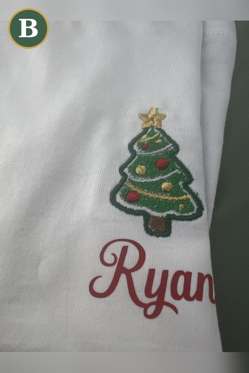 Option B: embroidered Christmas tree logo with the printed name Ryan on a white tee